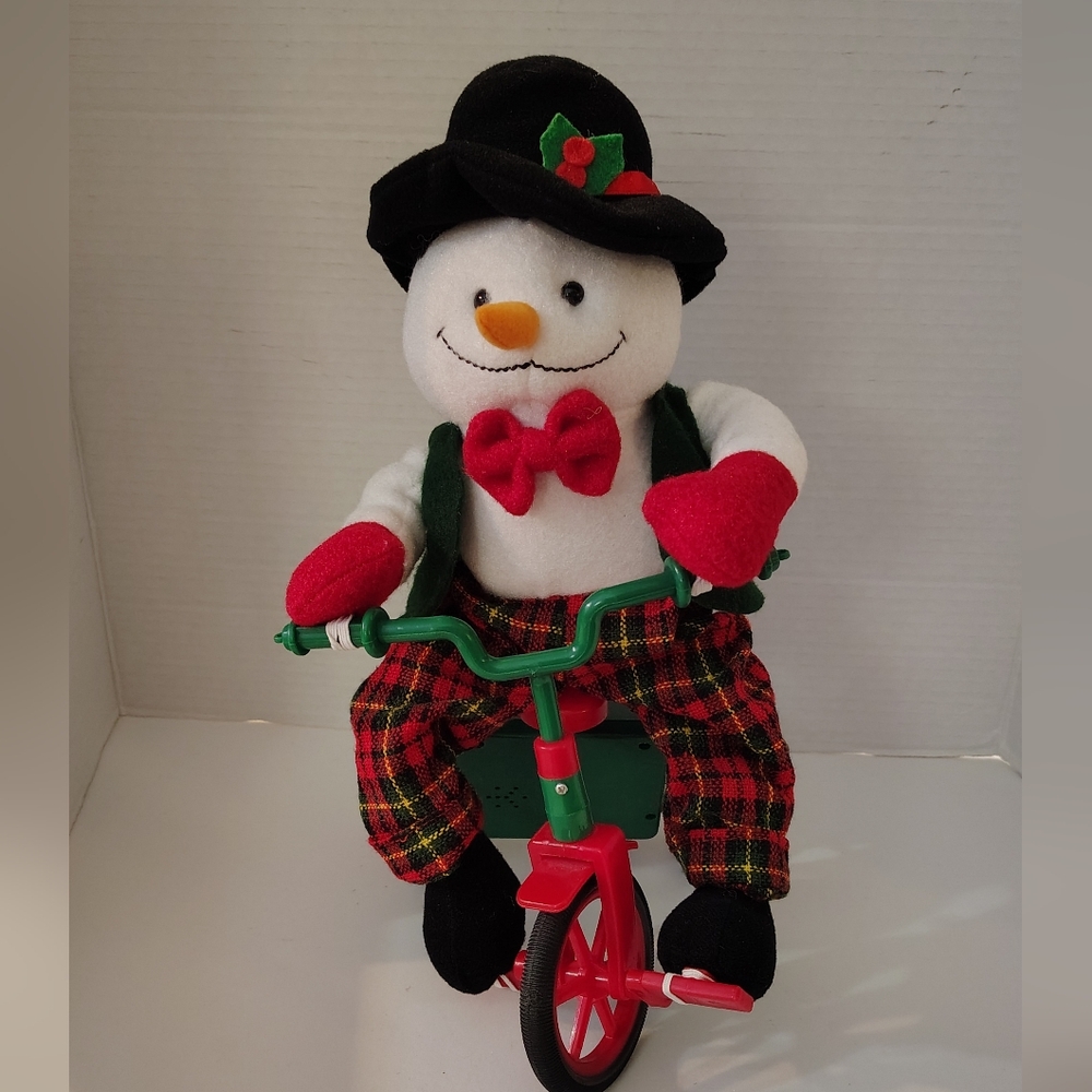 Musical Tricycling Snowman & Plays Santa Clause Is Coming To Town.